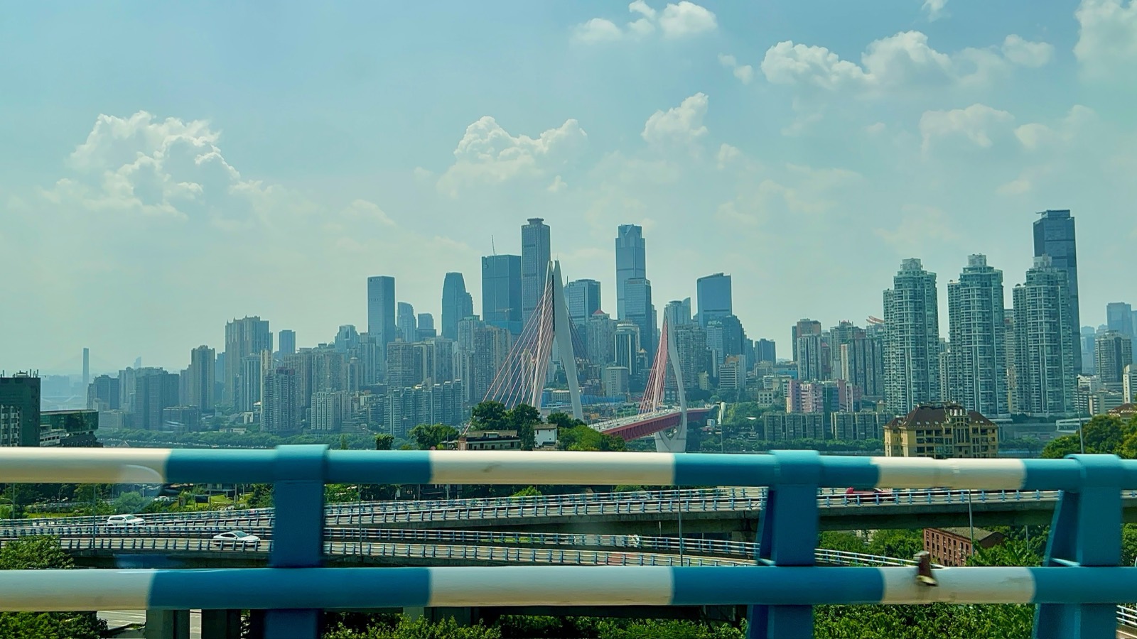 City skyline and bridge seen from the road